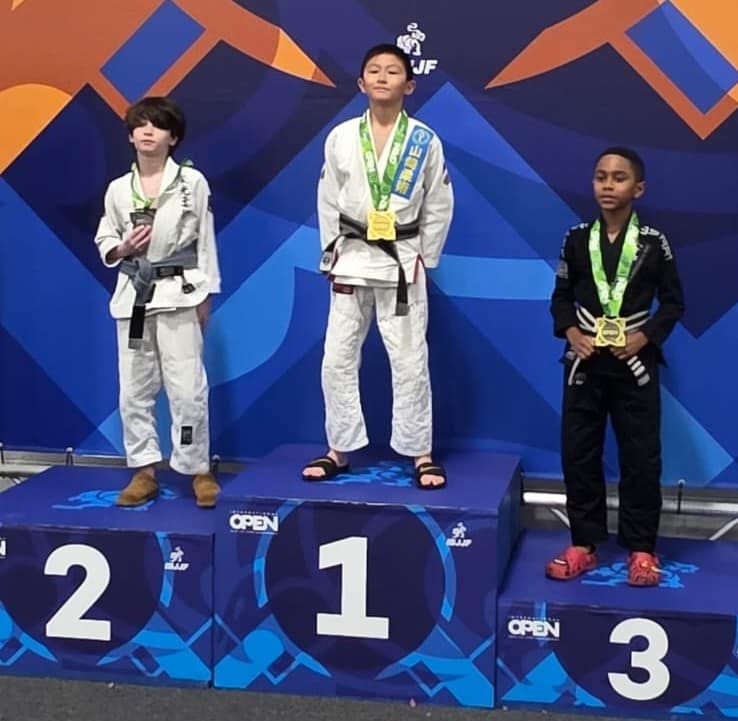 Mason celebrates winning Gold at the New Jeresy IBJJF Open.