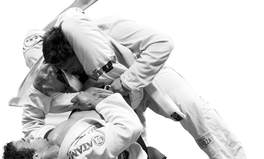 Brazilian Jiu-Jitsu practitioner executing a triangle choke submission from the guard.