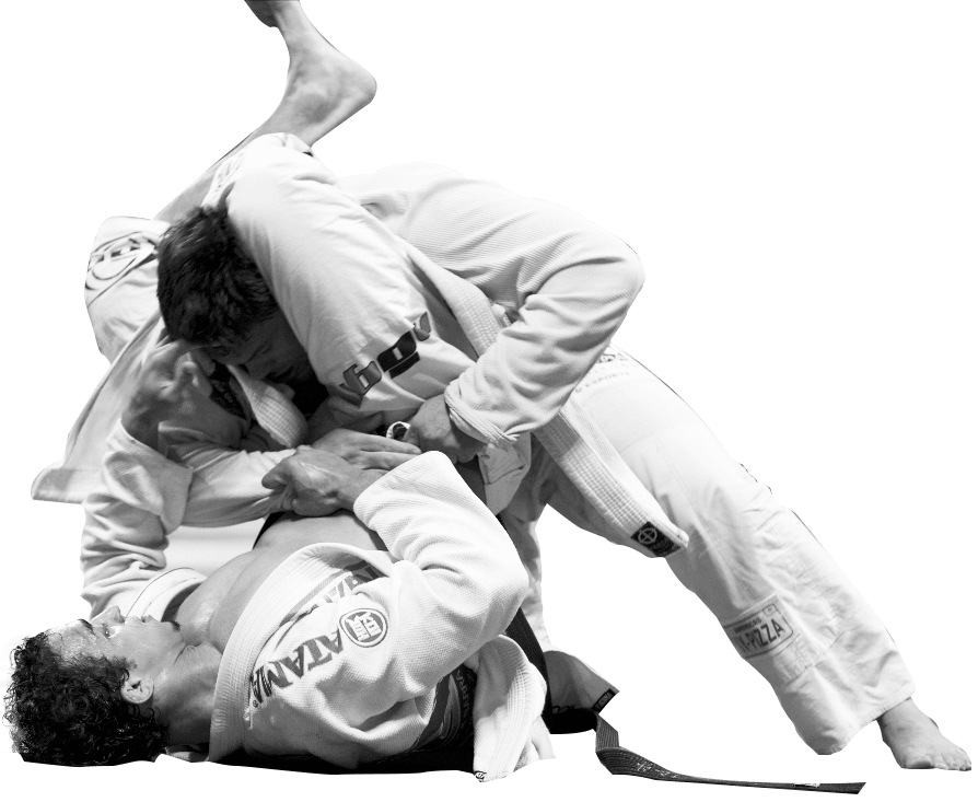 Brazilian Jiu-Jitsu practitioner executing a triangle choke submission from the guard.